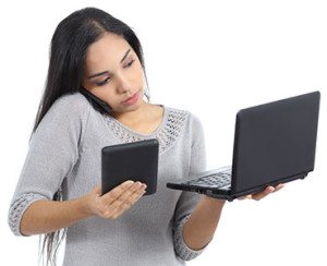woman-juggling-laptop-phone