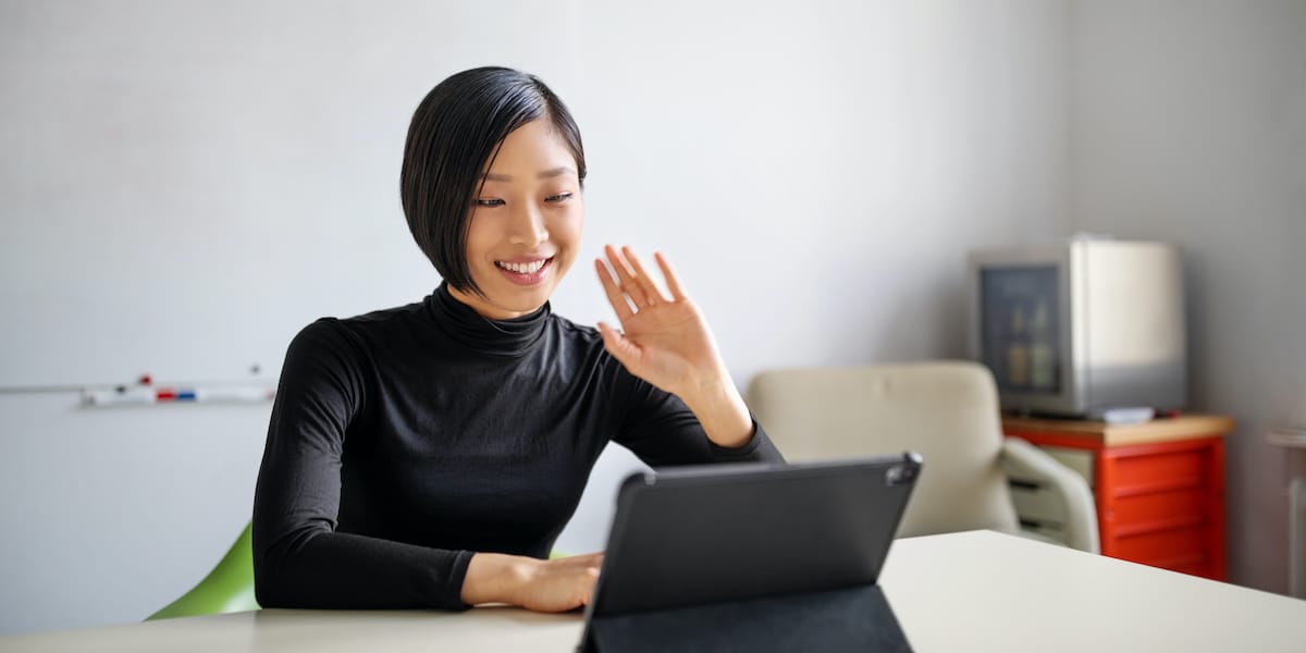 Female professional making a video call in office