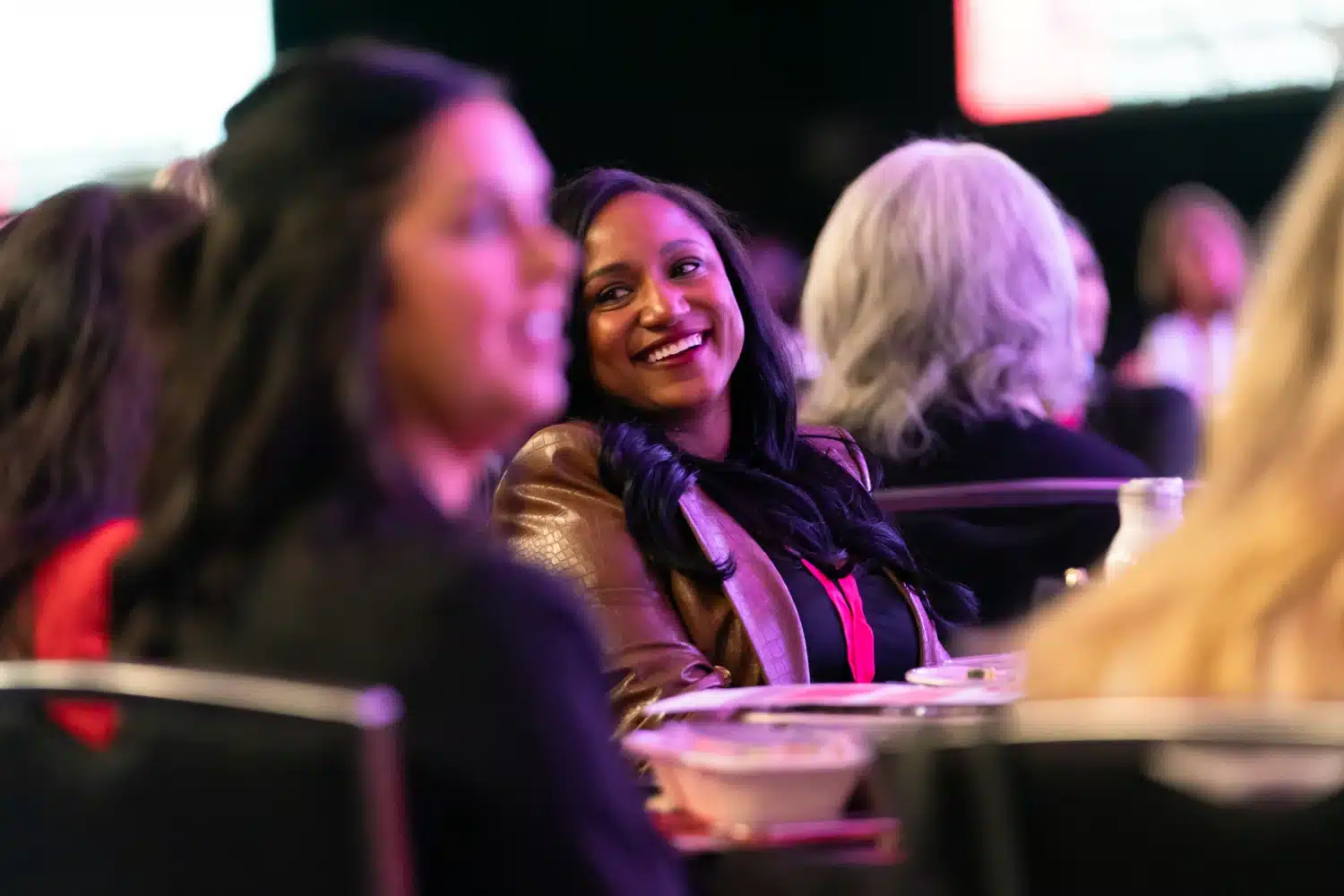 Conference for Women attendees attending keynote session